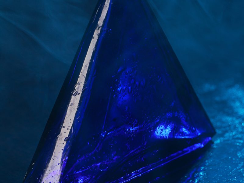 Little blue bottle on a gradient background