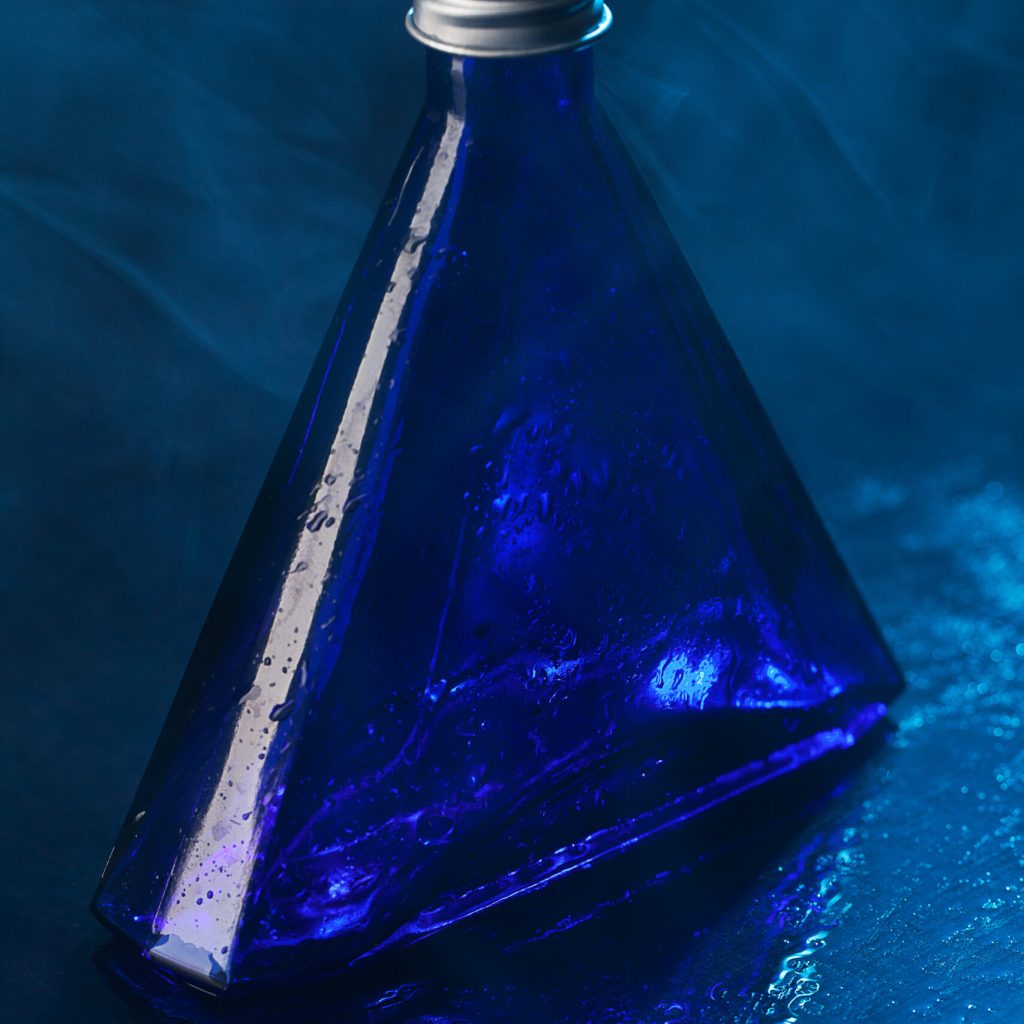 Little blue bottle on a gradient background